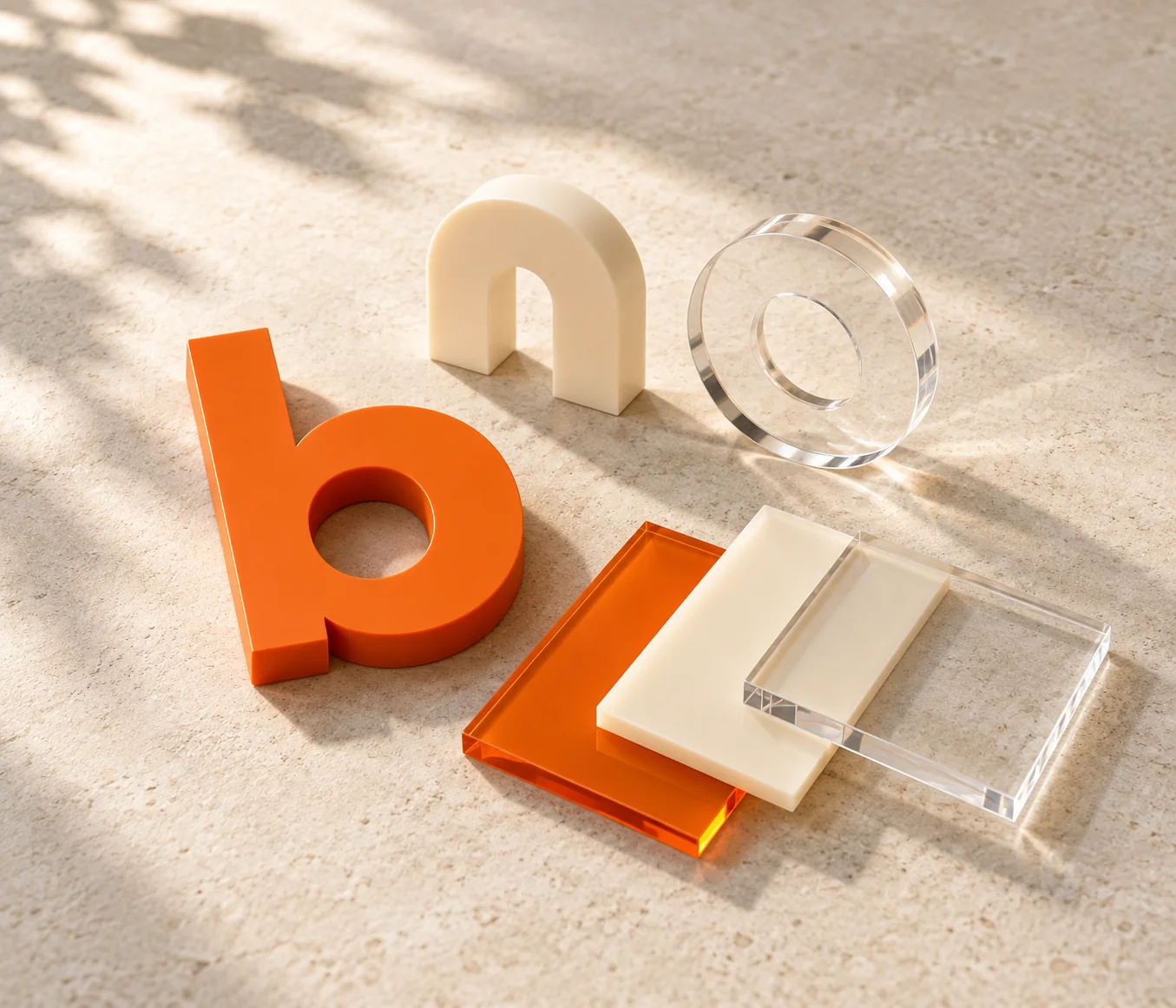 Coloured acrylic lettering and material samples — appearance study