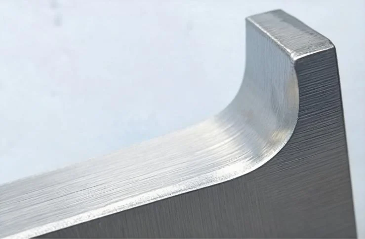 Close view of a formed letter face, edge and return