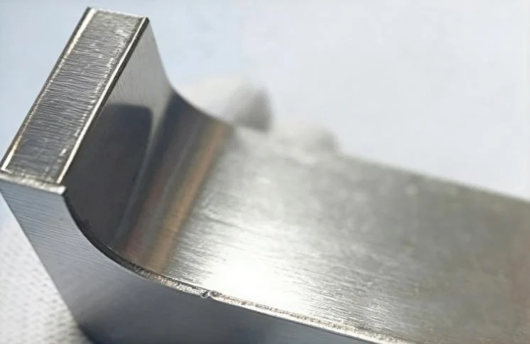 Close-up of a brushed metal letter face and formed return